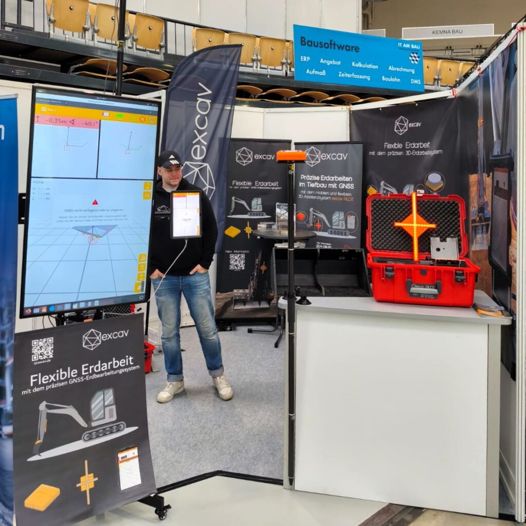 excav Team mit Indoor-Messestand auf der Baufachmesse 70. NordBau 2025 in Neumünster in Schleswig-Holstein